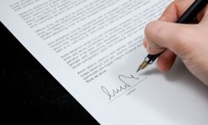 196758 handtekening overname fusie pen papier