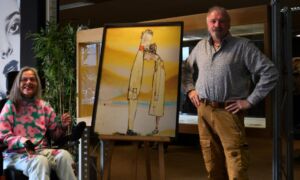 Floortje en Hendrik Jan bij kunstwerk