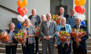 Lintjesregen 2026 groepsfoto ochtend enschede