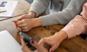 Senior person school class with smartphone